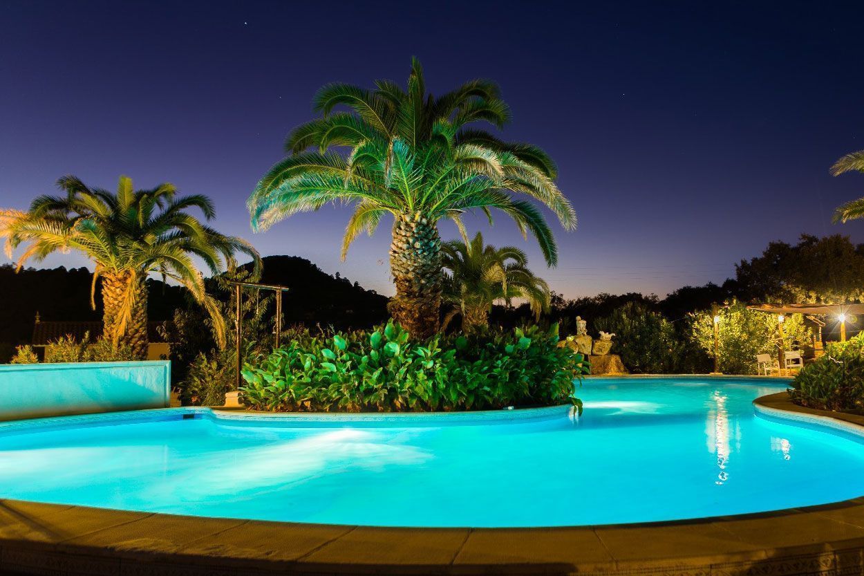 Lake house swimming pool at sunset. In Córdoba
